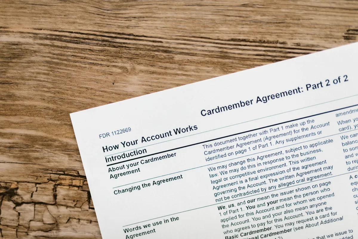 A stack of purchase agreement documents highlighting the complexity of real estate transactions.